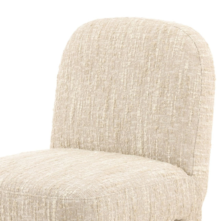 Beige upholstered chair back on a white background