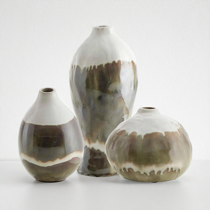Three ceramic vases with brown and beige glaze on a white background