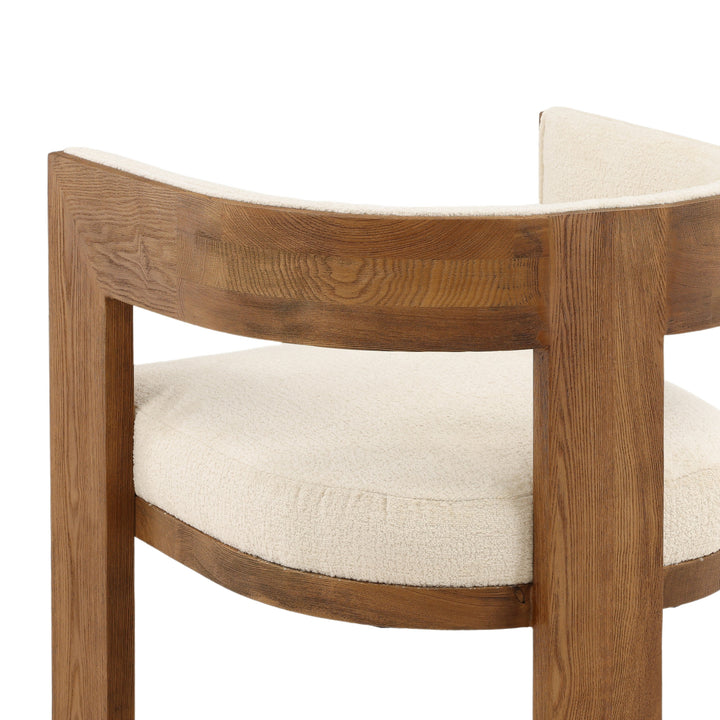 Wooden chair with a white cushion on a white background