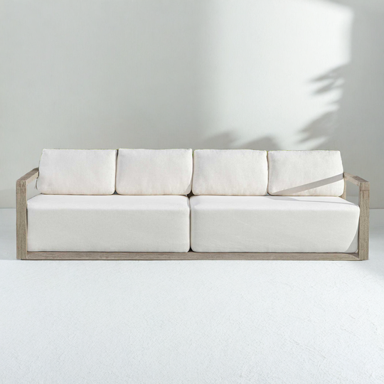 White sofa with wooden frame on a white background