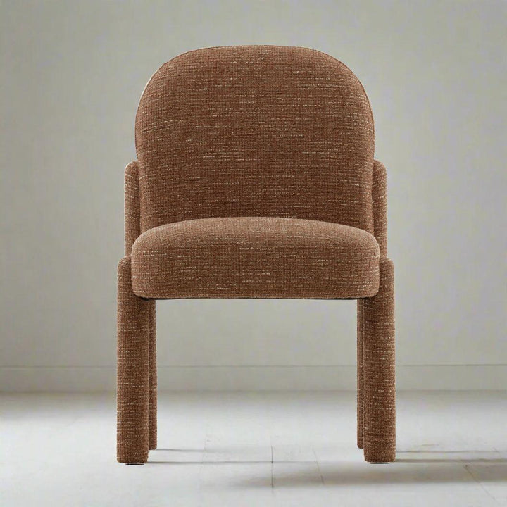 Brown upholstered chair on a light gray background