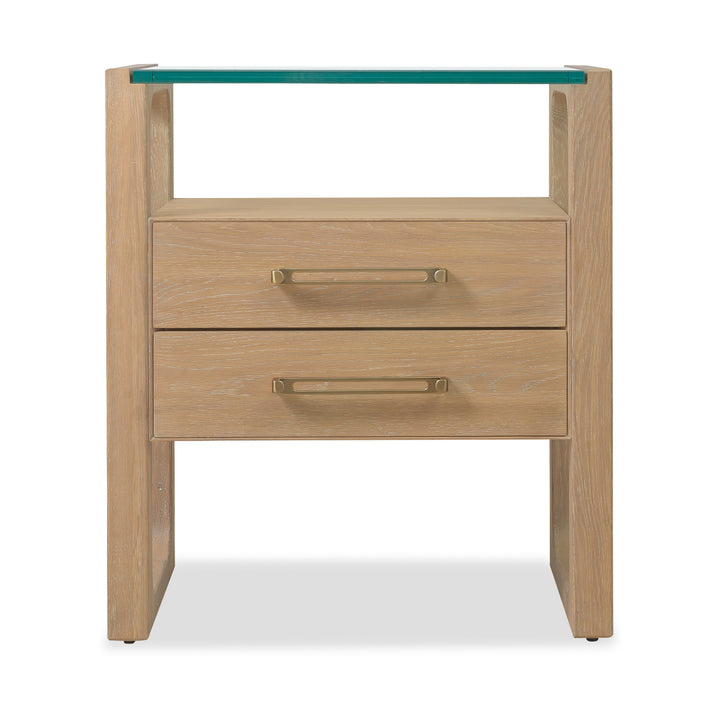 Modern light wood nightstand with two drawers and a glass top, featuring sleek gold handles.