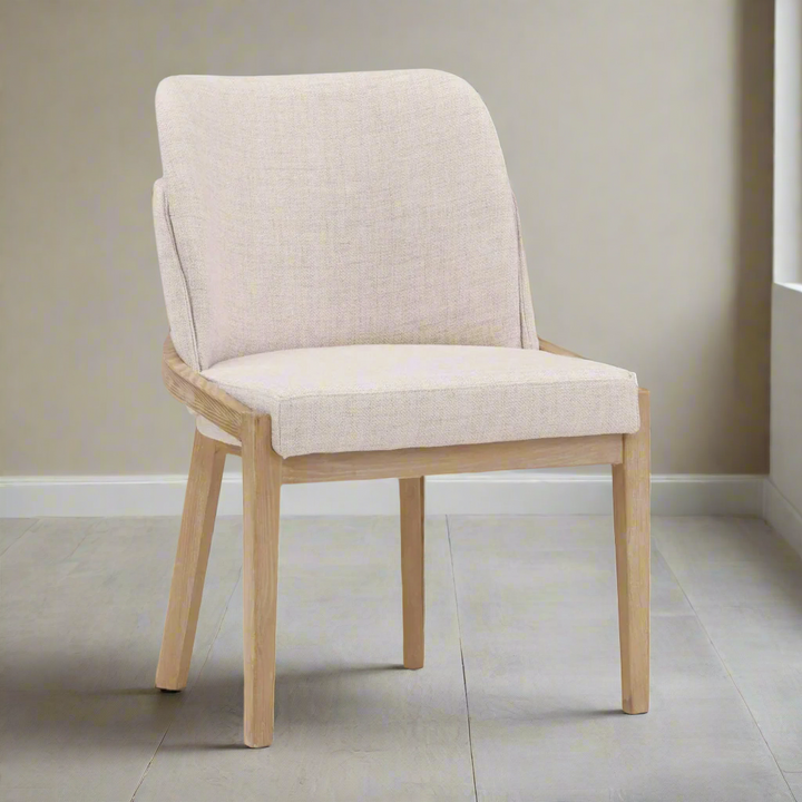 Beige upholstered chair with wooden legs