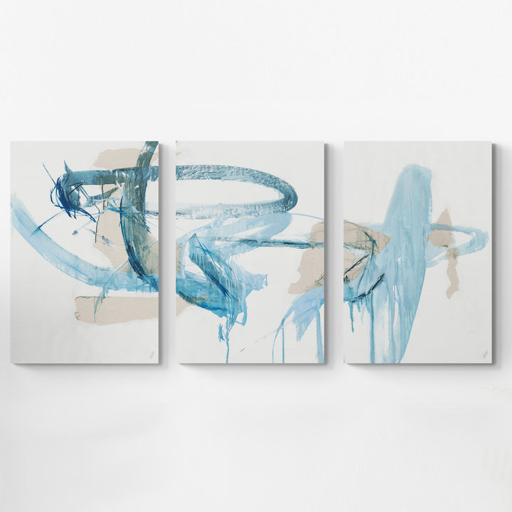 Abstract triptych artwork featuring flowing blue brushstrokes and soft beige accents on white canvas.