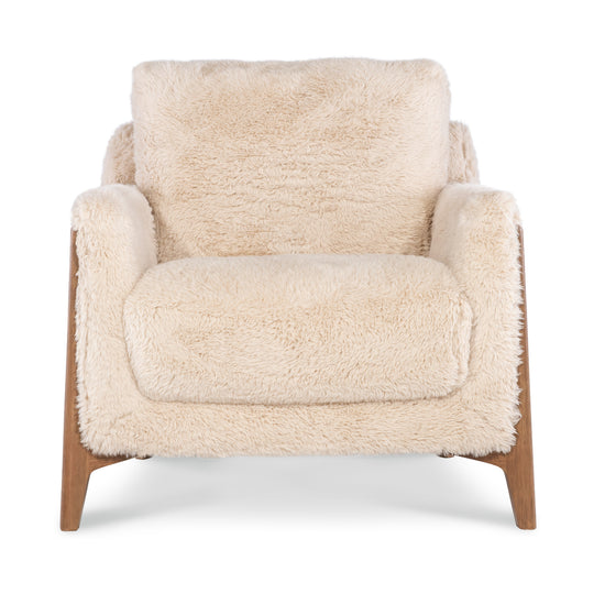 Front view of a cream-colored faux-shearling accent chair with mid-century modern wooden legs.