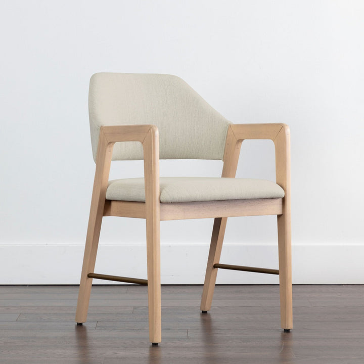 Milton dining armchair with a light wash frame and Mina Ivory upholstery