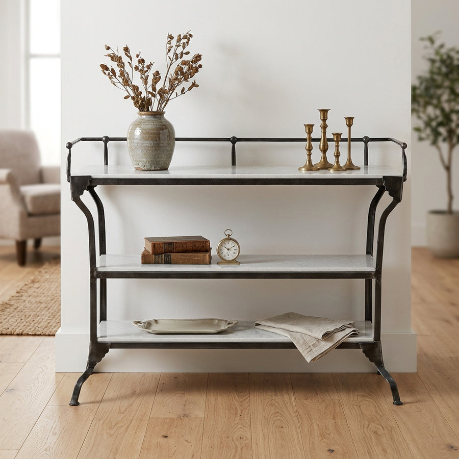 Console table with marble shelves and metal frame on a white background