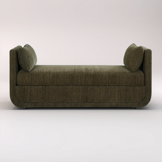 Green sofa with two cushions on a white background