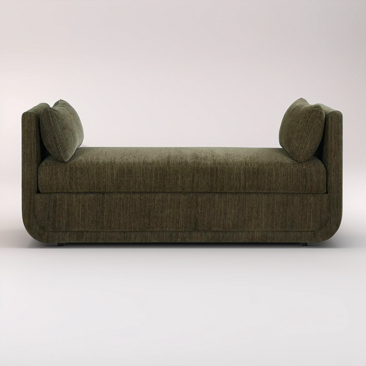 Green sofa with two cushions on a white background