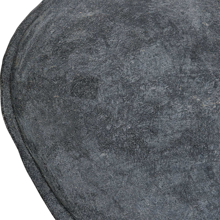 Close-up of a textured gray stone surface