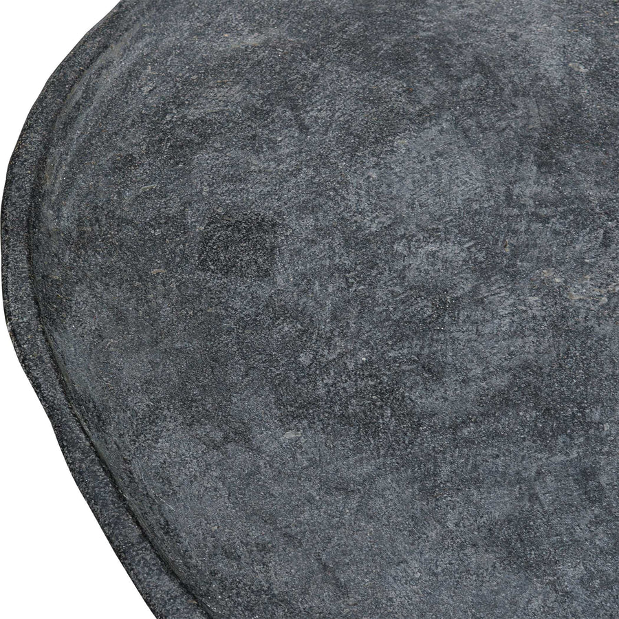 Close-up of a textured gray stone surface