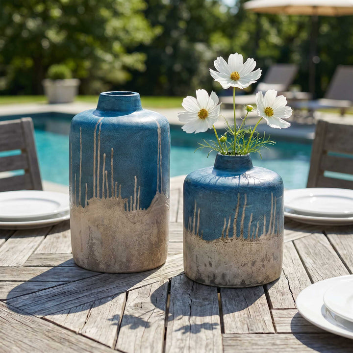 Two blue and beige ceramic vases