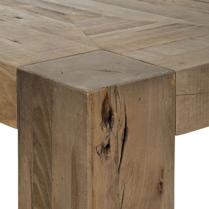 Close-up of a wooden table with a rustic finish