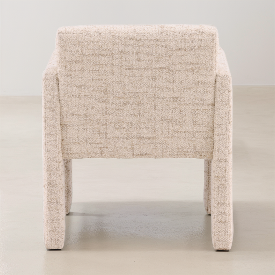 Beige armchair on a plain background