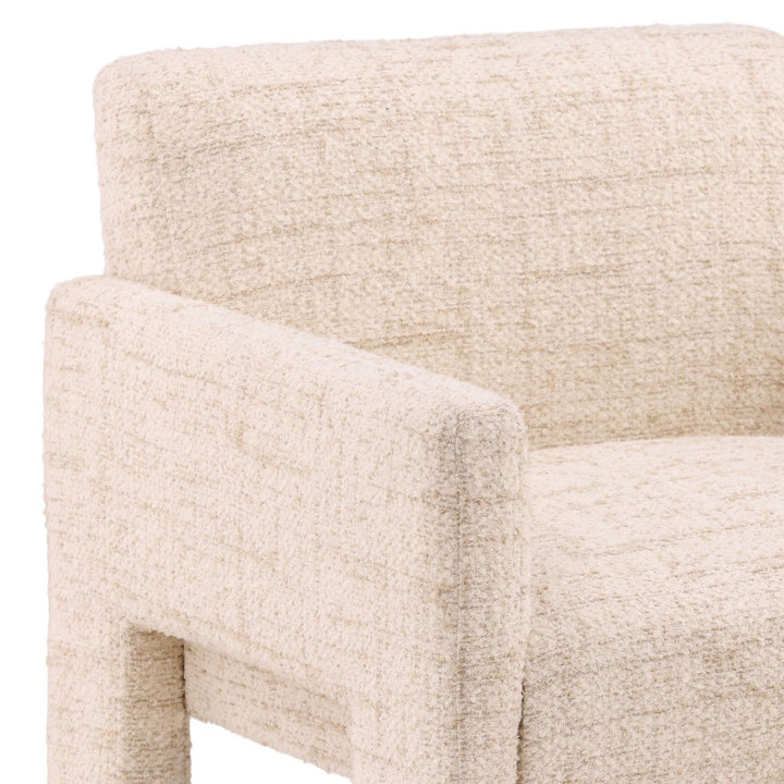 Beige textured armchair on a white background
