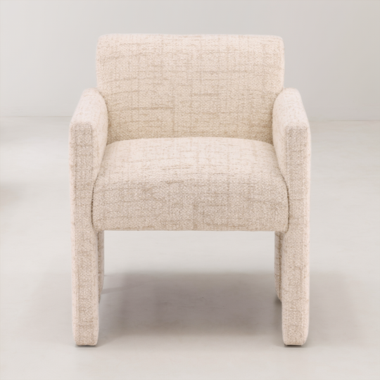 Beige armchair on a light gray background