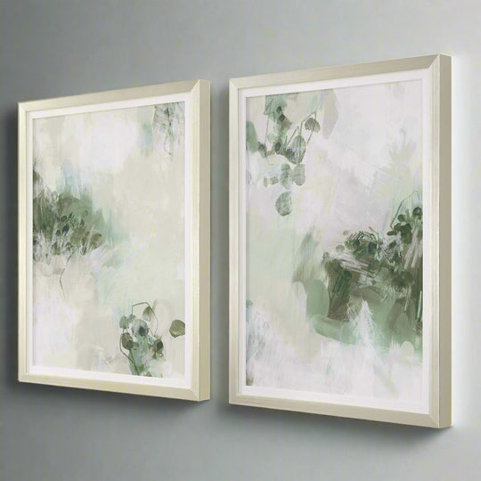 Two framed abstract artworks with green and white colors on a white background