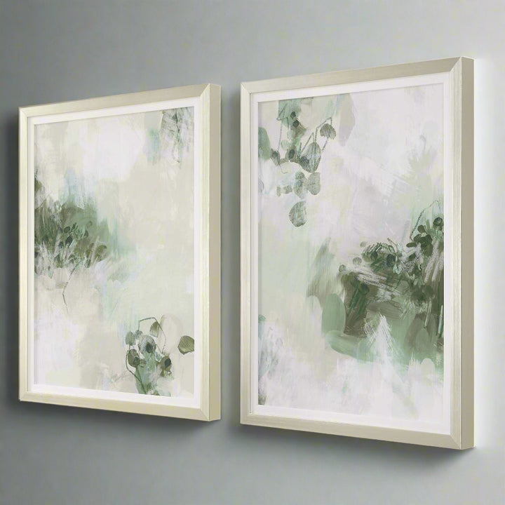Two framed abstract artworks with green and white colors on a white background