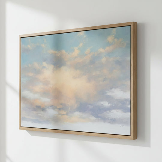 Framed artwork of a cloud painting with a wooden frame