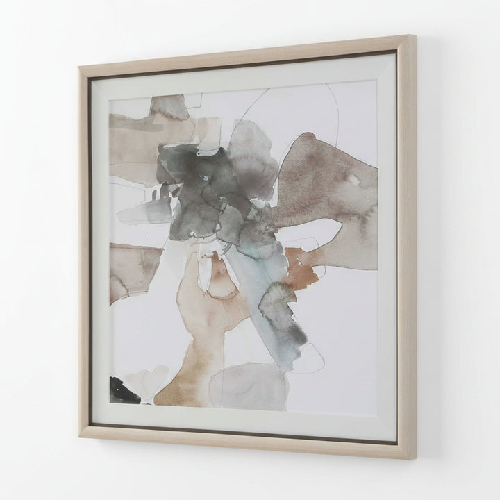 Glass framed abstract art piece with earthy tones