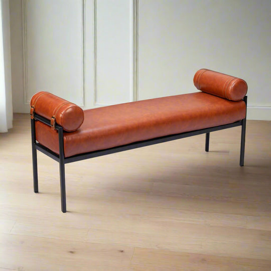 Brown leather bench with rolled ends on a white background