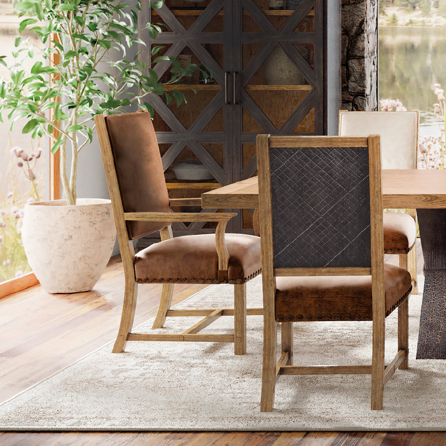 Brown leather armchair with wooden frame