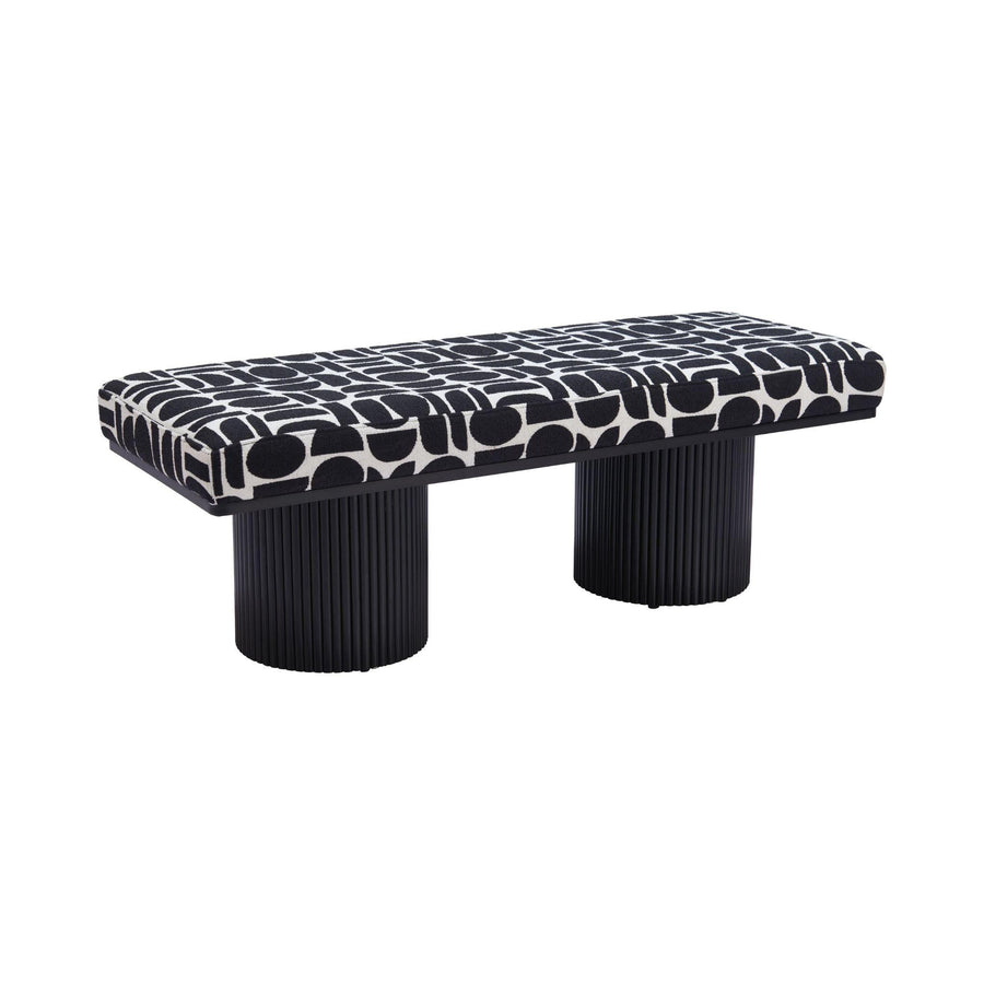 Modern bench with patterned top and black cylindrical legs on a white background