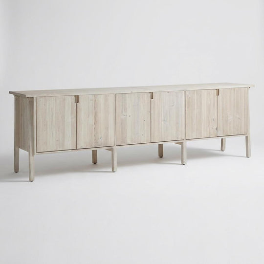 Light wooden sideboard on a white background