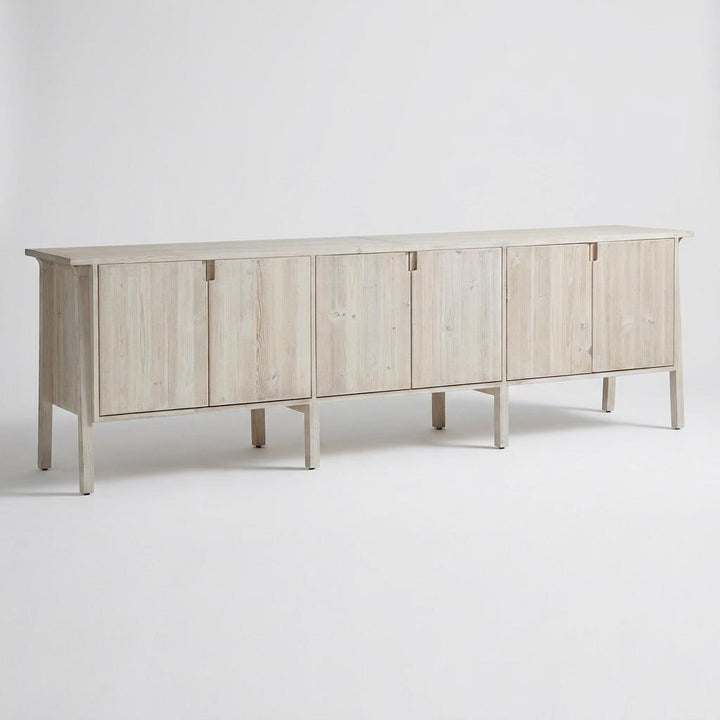 Light wooden sideboard on a white background