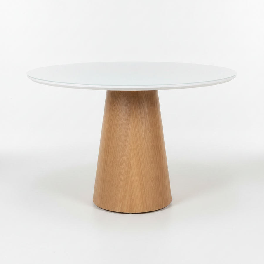 A modern round dining table with a light gray glass top and a tapered natural oak wood pedestal base