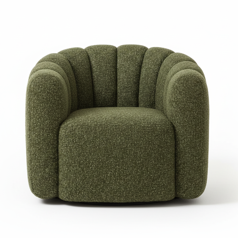 Green textured armchair with a black tiered side table, small potted plant with dried stems