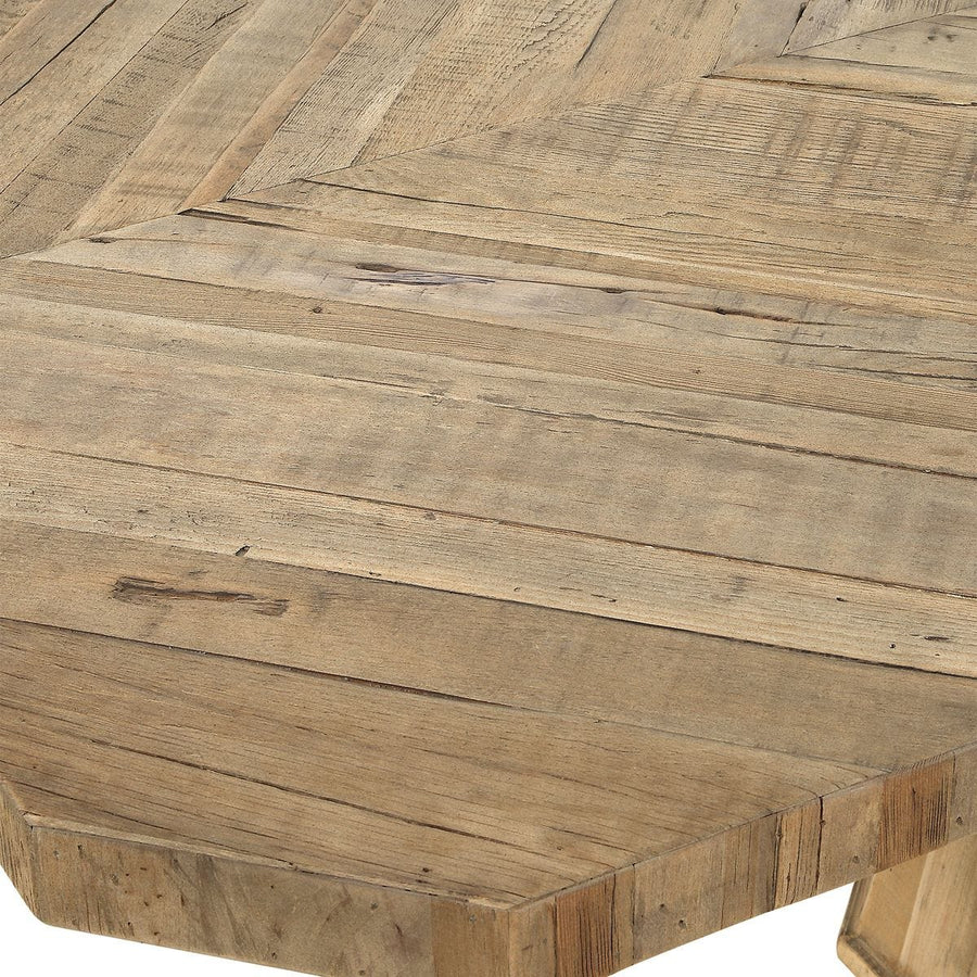 Close-up of a wooden table surface with a rustic finish