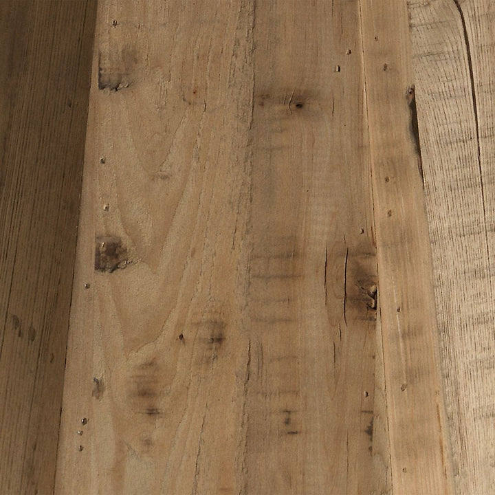 Close-up of a wooden surface with visible grain and texture