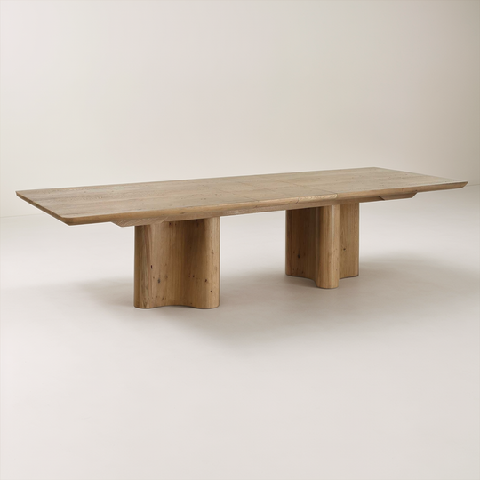 Wooden dining table on a plain background