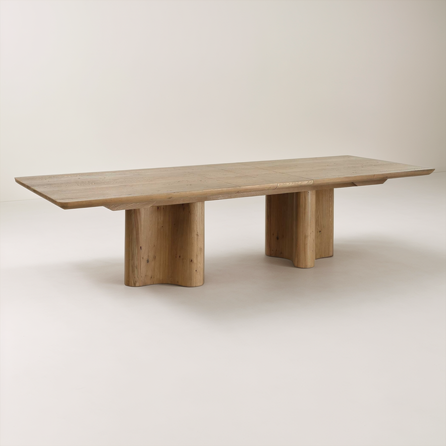 Wooden dining table on a plain background
