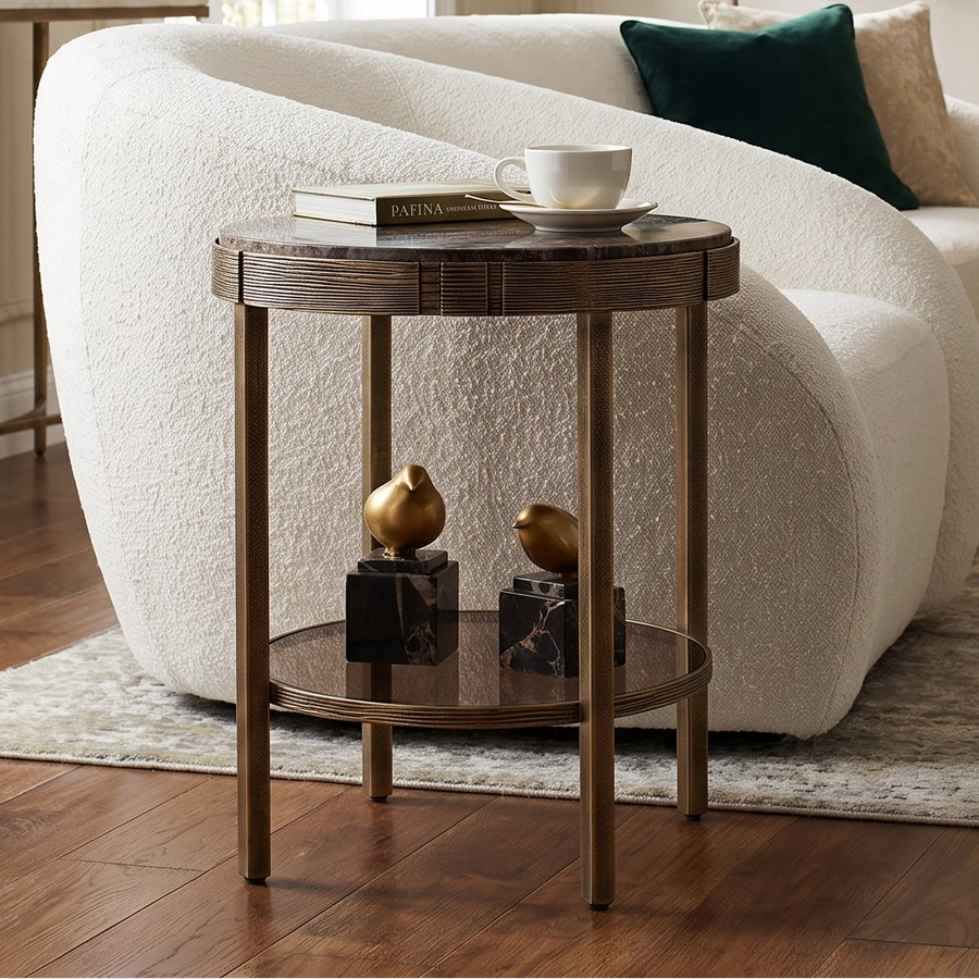 A round side table distressed bronze metal frame with brown marble-patterned top