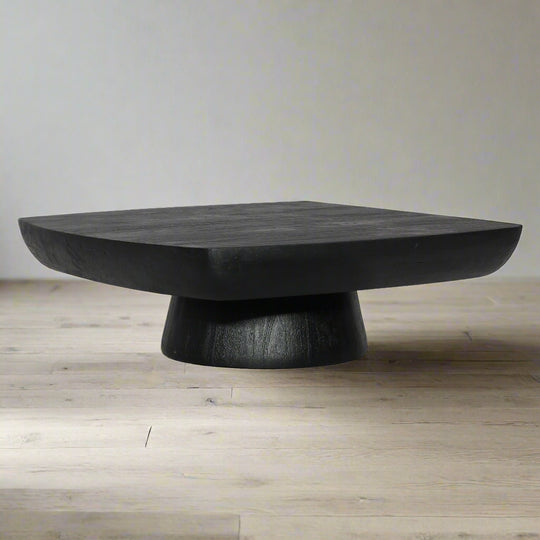Black wooden coffee table on a white background