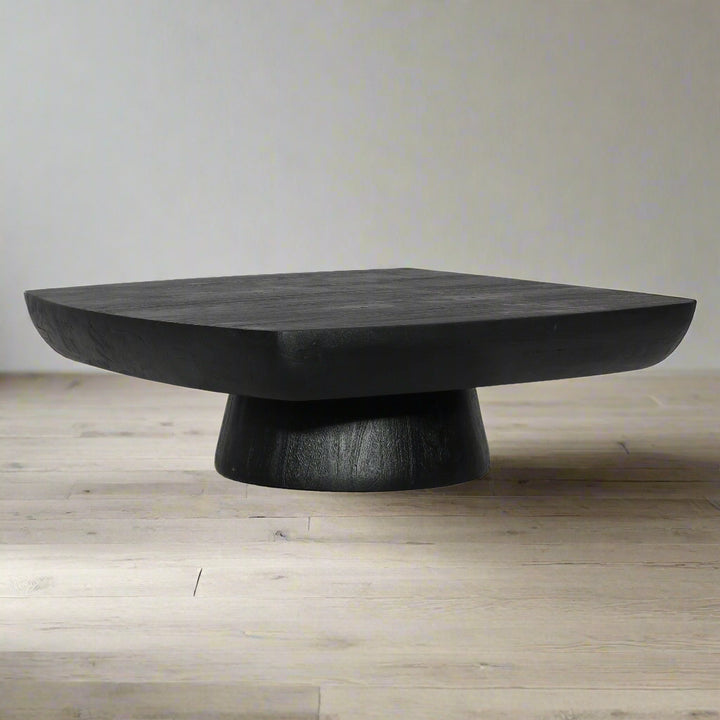 Black wooden coffee table on a white background