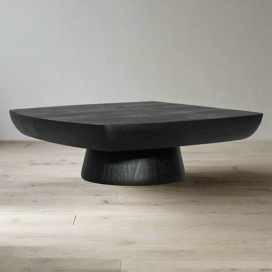 Black wooden coffee table on a white background