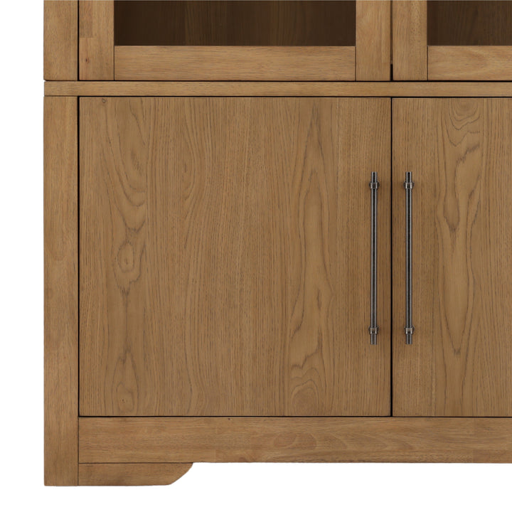 Wooden cabinet with two doors and metal handles on a white background