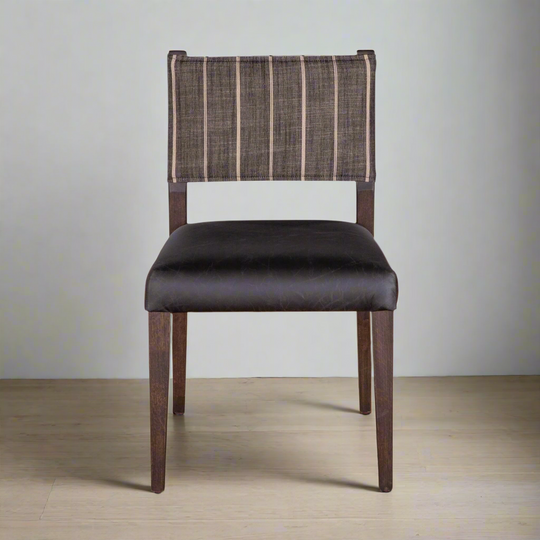 Brown chair with striped backrest on a white background