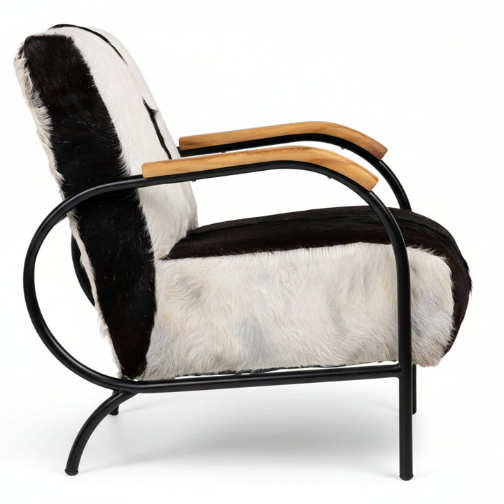 modern armchair, black metal frame, wooden armrests, black and white cowhide upholstery