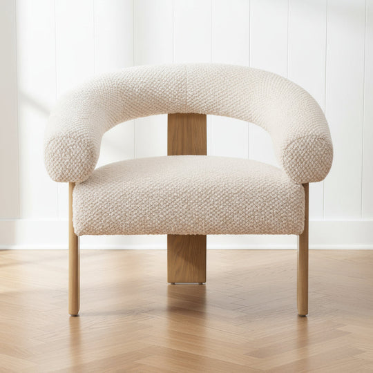 Cream-colored armchair with wooden legs