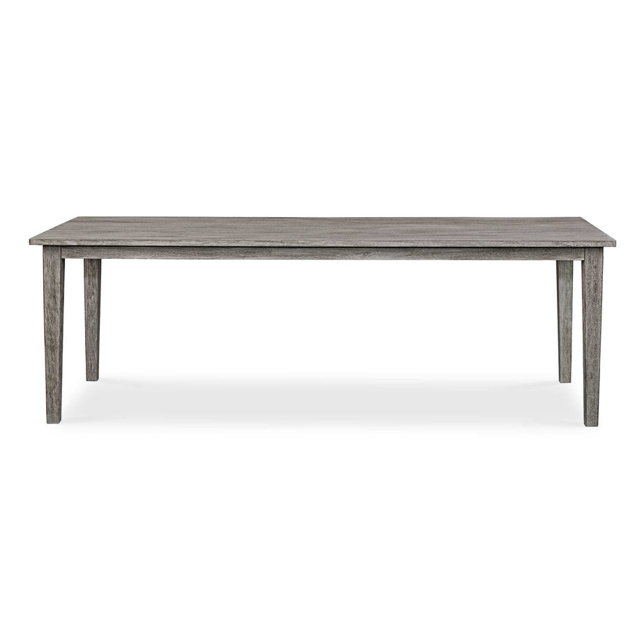 Wooden dining table with a grayish-brown finish on a white background