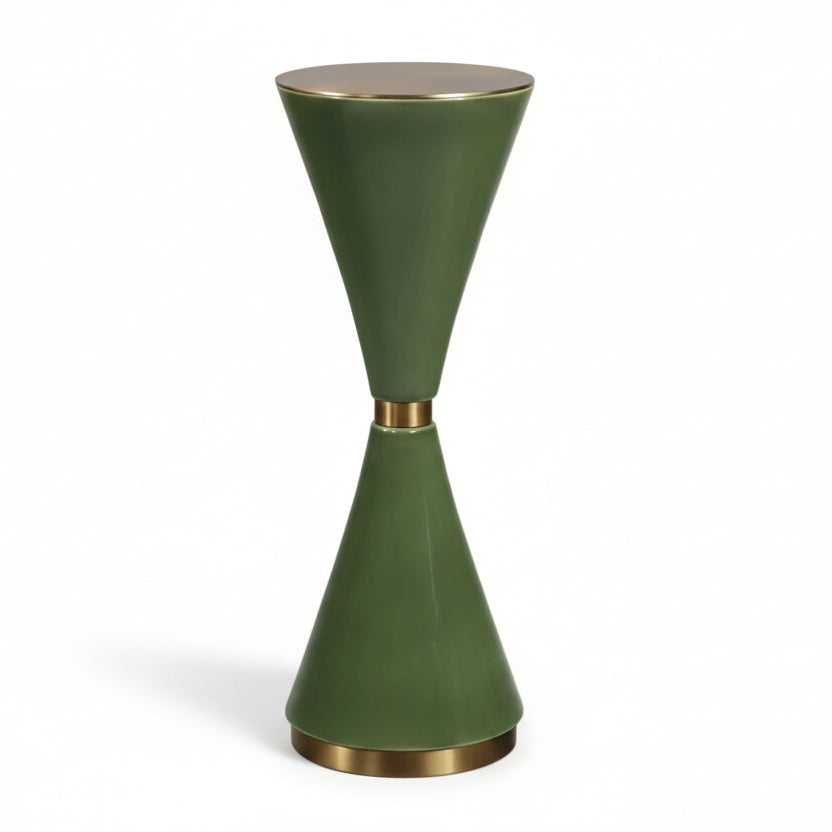 Green and gold ceramic side table on a white background