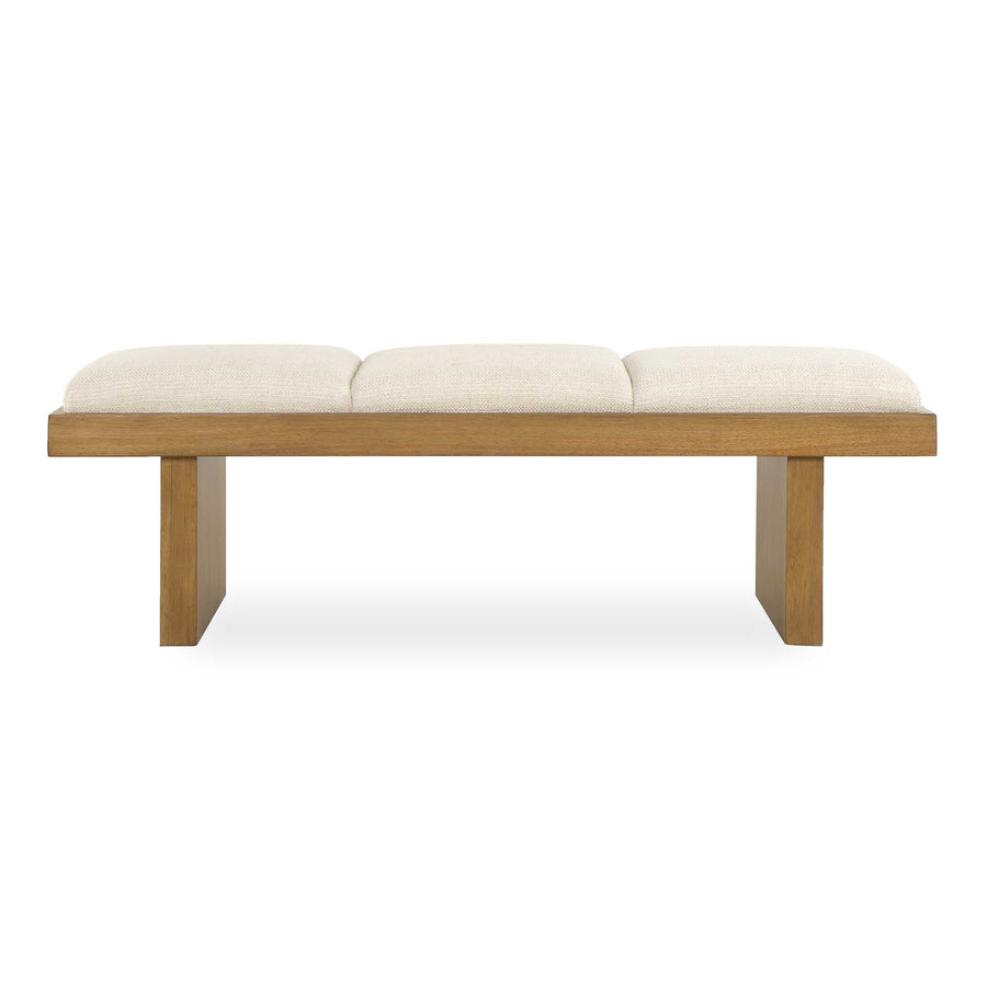 Wooden bench with white cushion on a neutral background