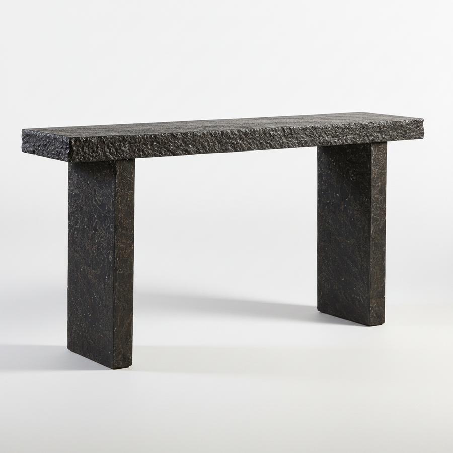 A dark gray stone console table with a textured rectangular top and two thick block legs, shown against a white studio background.