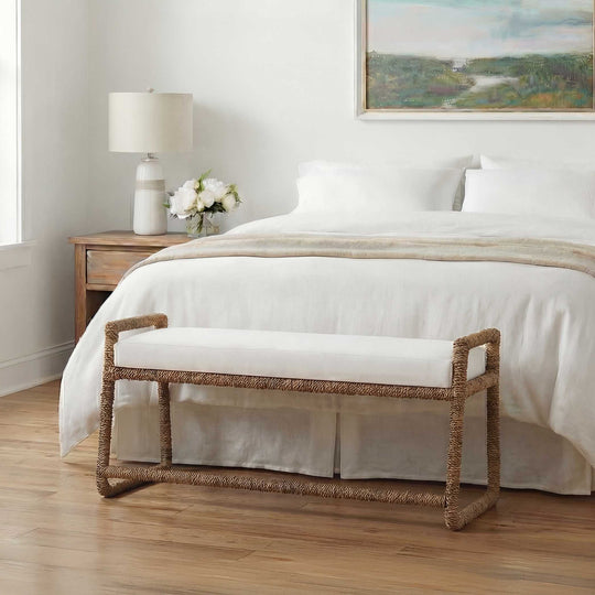 Bench with white cushion and natural woven frame