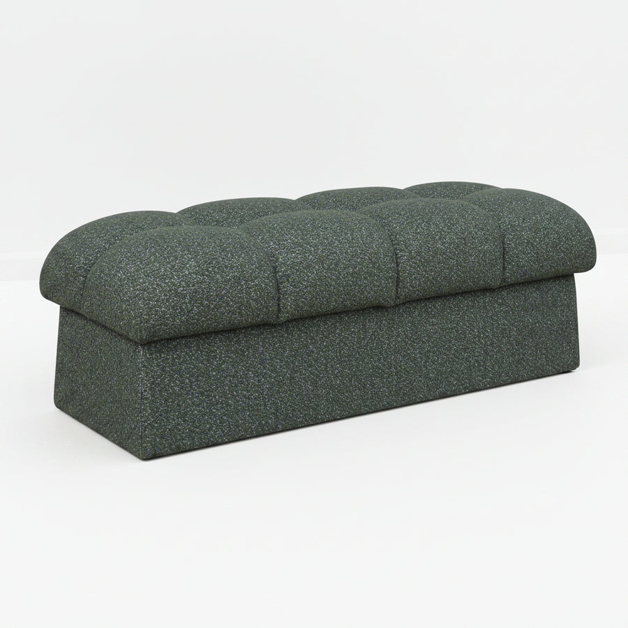 Dark gray upholstered bench on a white background