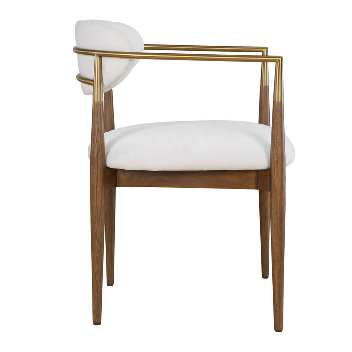 dining chair with wooden frame, white cushion, and gold armrests